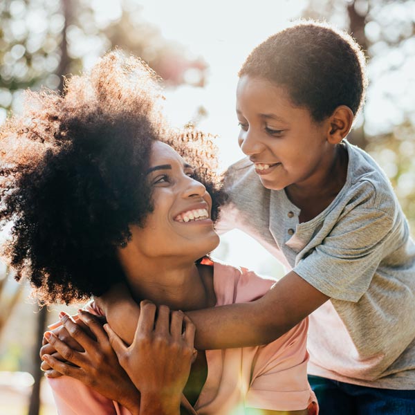 smiling mother and son